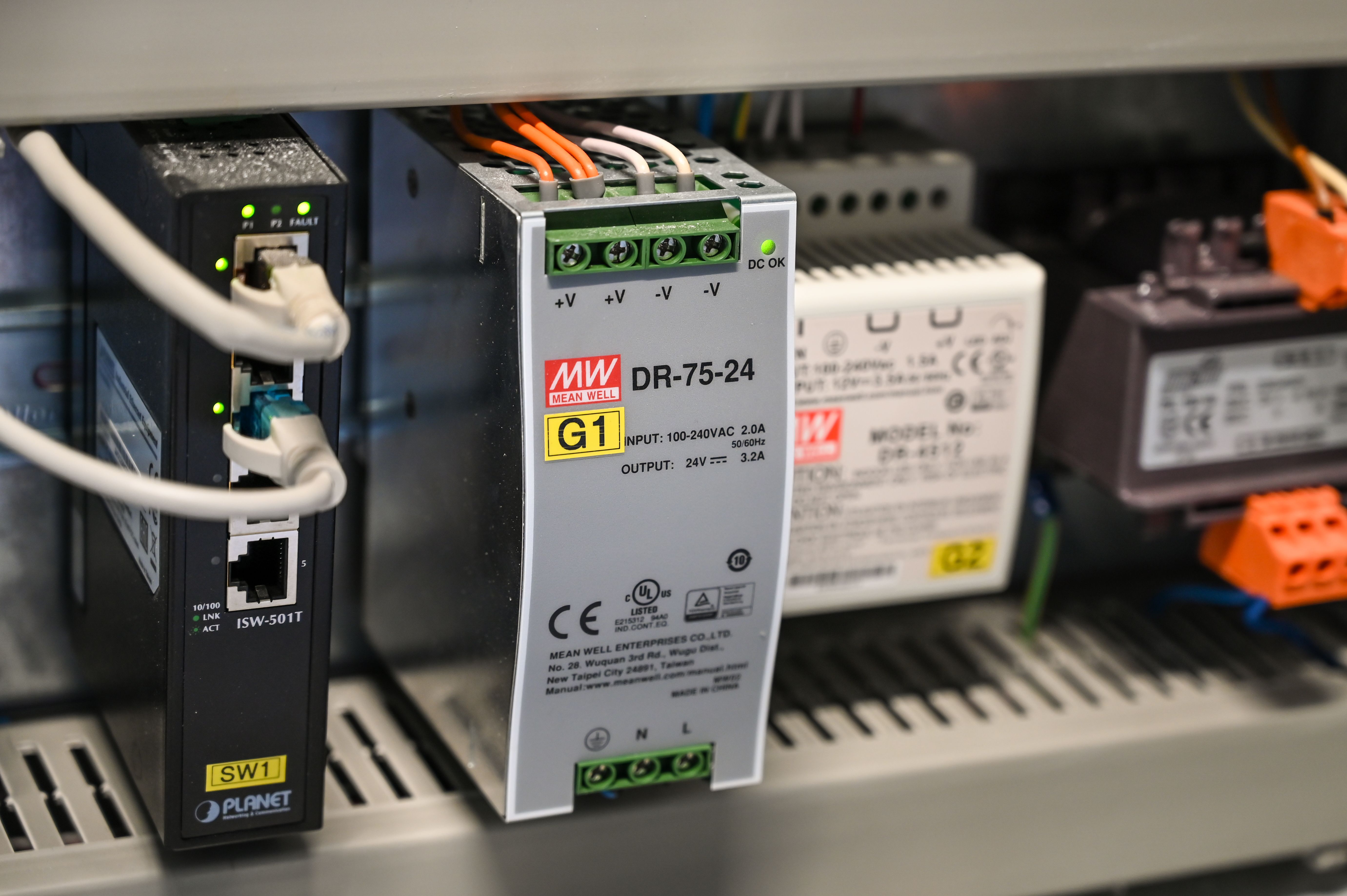 Gateway power supply and network switch in an equipment cabinet